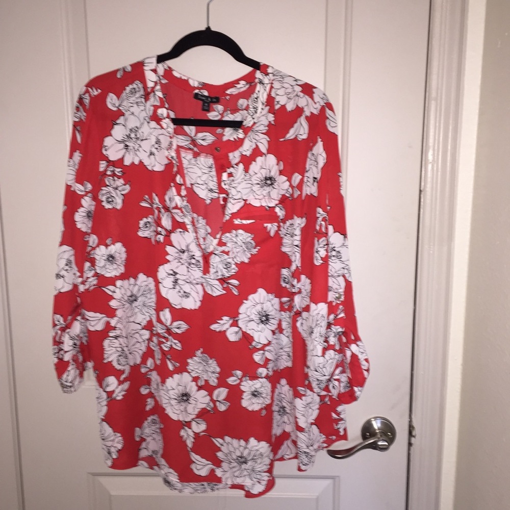 Red and white floral blouse